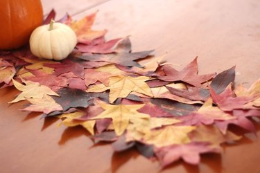 Table runner made with fall leaves.