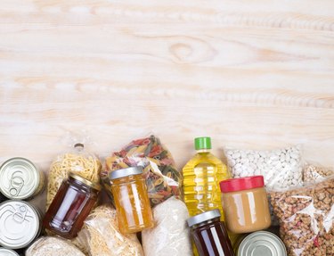 Food donations on wooden background