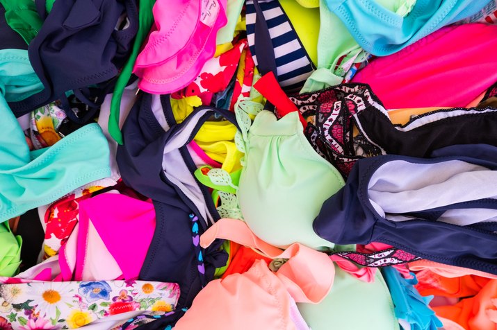 Colorful bikini store display.