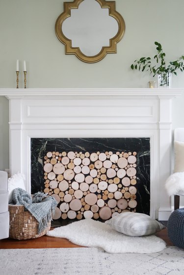 Faux stacked log fireplace cover