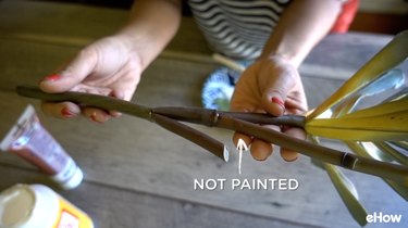 Painting artificial plant stems with acrylic paint