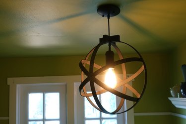 DIY orb pendant light using embroidery or quilting hoops.