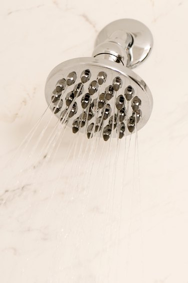 Shower head with flowing water