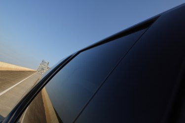 Car driving on desert road