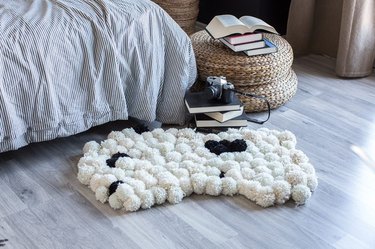 Pom pom rug.