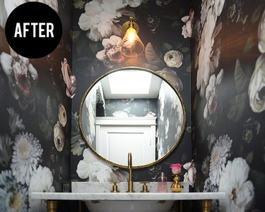 Powder room with bold floral wallpaper