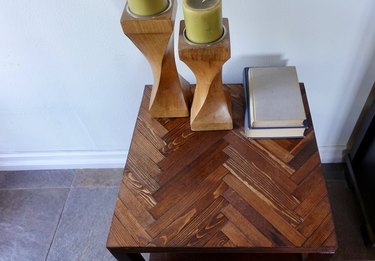 DIY herringbone pattern tabletop using paint sticks.