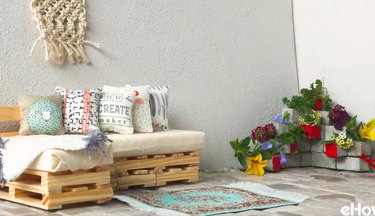 Finished planter in corner of decorated patio