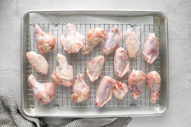 Chicken wings on baking sheet