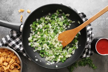 Cook onions and peppers