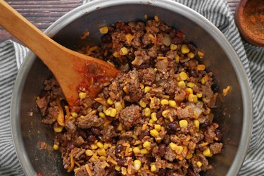 Mix ground beef with beans and corn