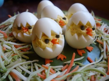 Deviled egg Easter chicks on plate.