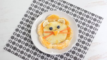 Plated lion face fruit snack