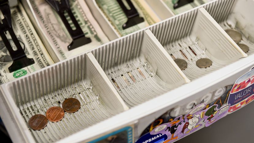 change drawer of the cash register at Symbiote Collectibles