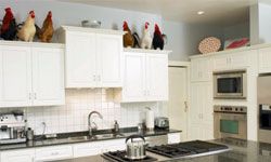 It was a clean, modern kitchen until someone decorated with roosters.