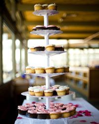 A whimsical tower of cupcakes makes a chic statement and will photograph beautifully.