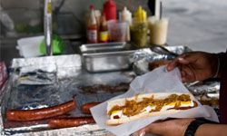 Hot dogs are classic street fare. More mustard, please!