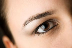 Apply a neutral shade under the brow and an accent shade in the crease of your eye.