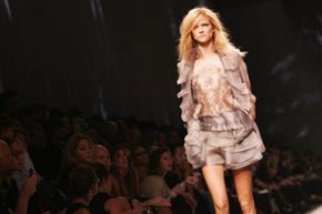 Metallic fabrics and deconstructed styles are popular for summer 2010.