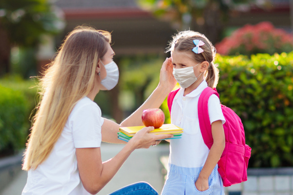 How to Get Kids to Wear a Face Mask | There are so many templates, patterns, and DIY tutorials to teach you how to make face masks for kids - some without sewing! - but many parents are struggling to figure out how to get kids to wear masks once they have them. In an age of social distancing, face masks are often a requirement, which can be a nightmare for children, especially those with sensory processing disorder and challenges. Check out our tips to get kids comfortable with face masks!